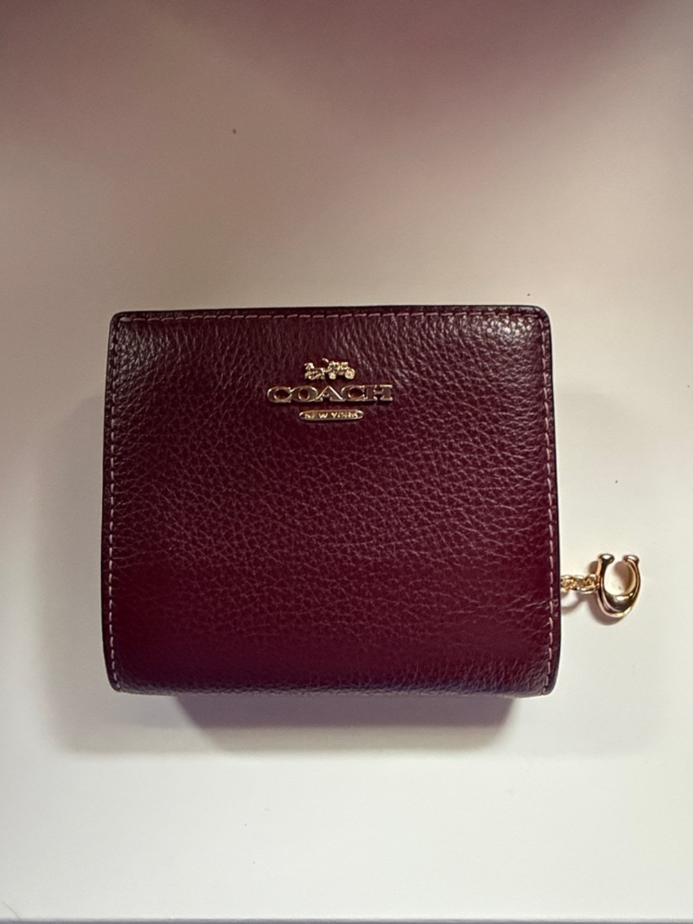 Coach Pebbled Leather Compact Wallet in Burgundy with Gold Hardware